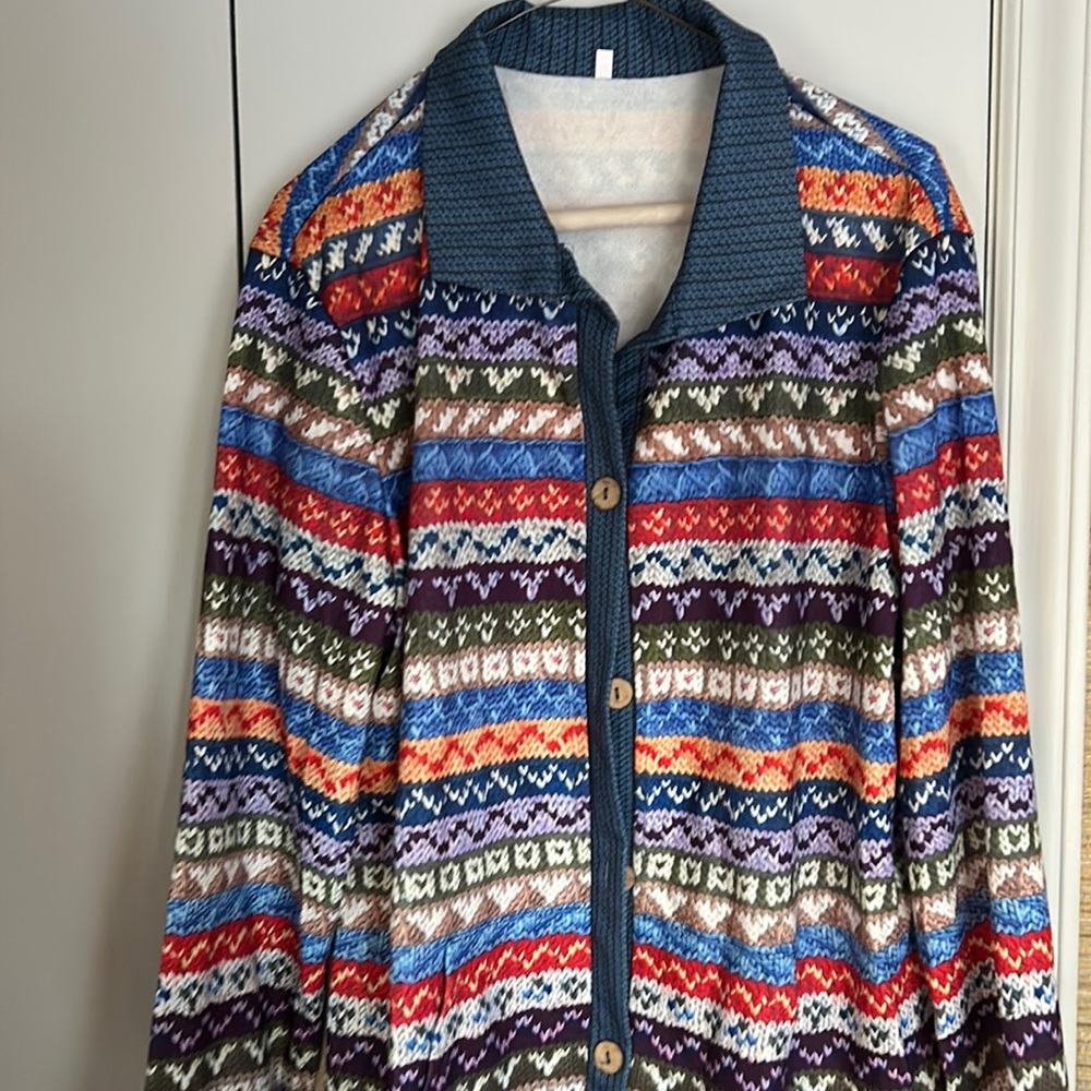 Brand new, never worn. Button up shirt made to look like a winter cardigan.